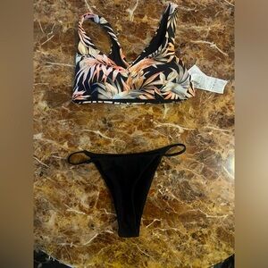 NWOT Rip Curl top & black bottoms!